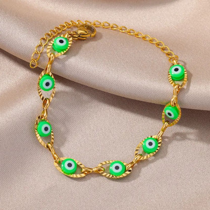 Bracelet Oeil Turc vert avec maillons dorés, symbole de chance et d’harmonie